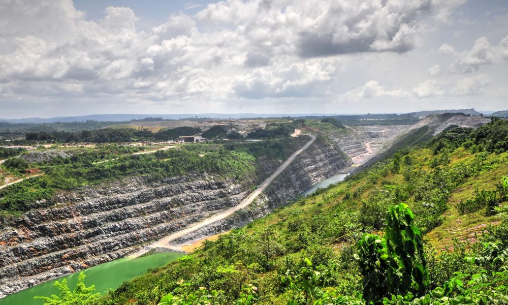 Open Pit Gold Mine in Ghana, Africa with a view of the cut out earth.