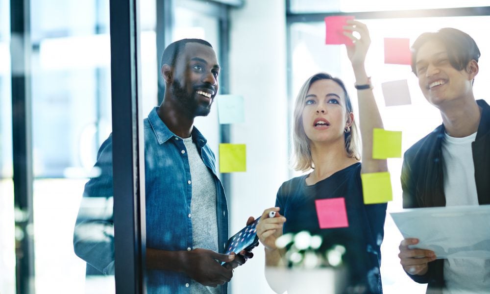 Shot of a group of colleagues having a brainstorming session in a modern office