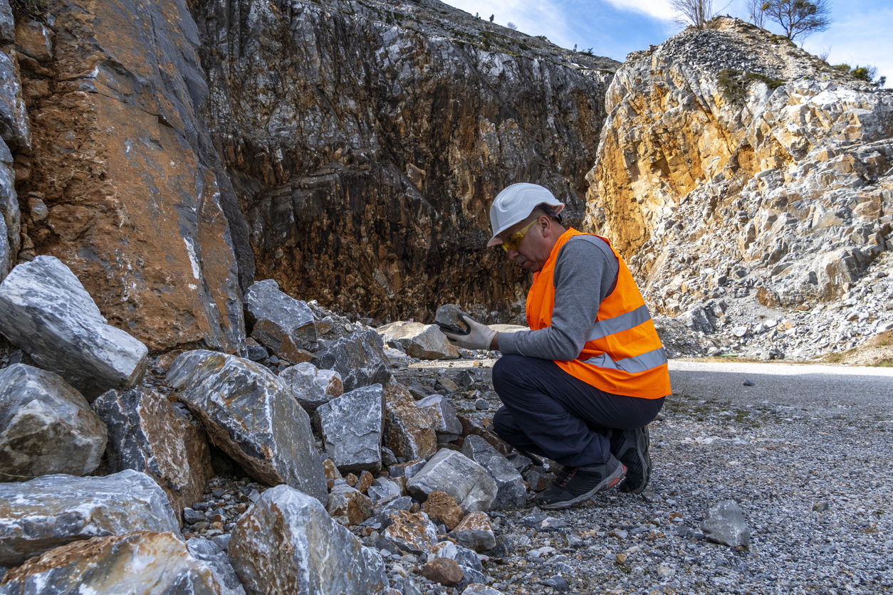 Geologist inspecting a mine,Explorers collect soil samples in search of minerals, Velilla del rio Carrión, Palencia - Spain