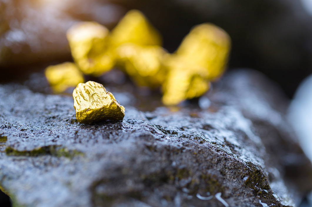 Gold on a stone floor