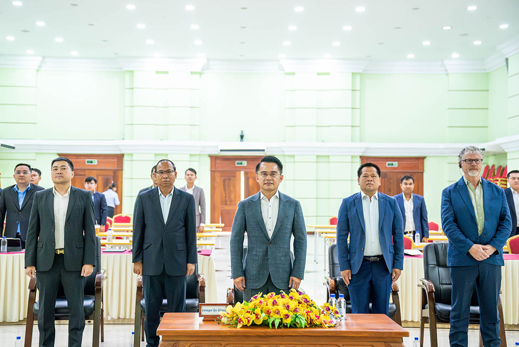 A group of people standing in a room
